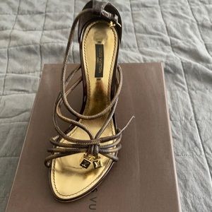 Luis Vuitton wedges.